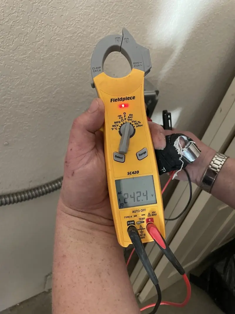 Voltage testing with clamp meter during Electrical Installation Services in Willoughby
